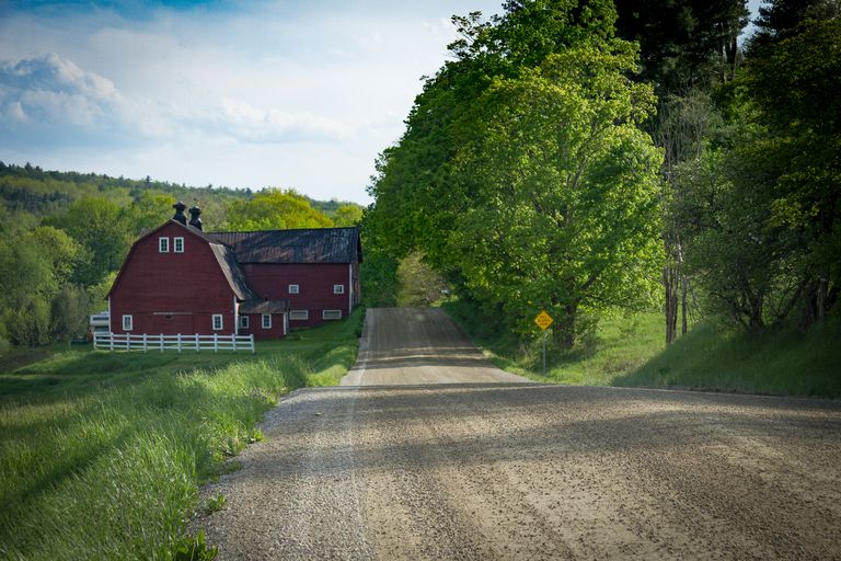 Red barn on dirt road